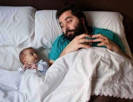 Like-Father-Like-Son-Relaxing-In-Bed